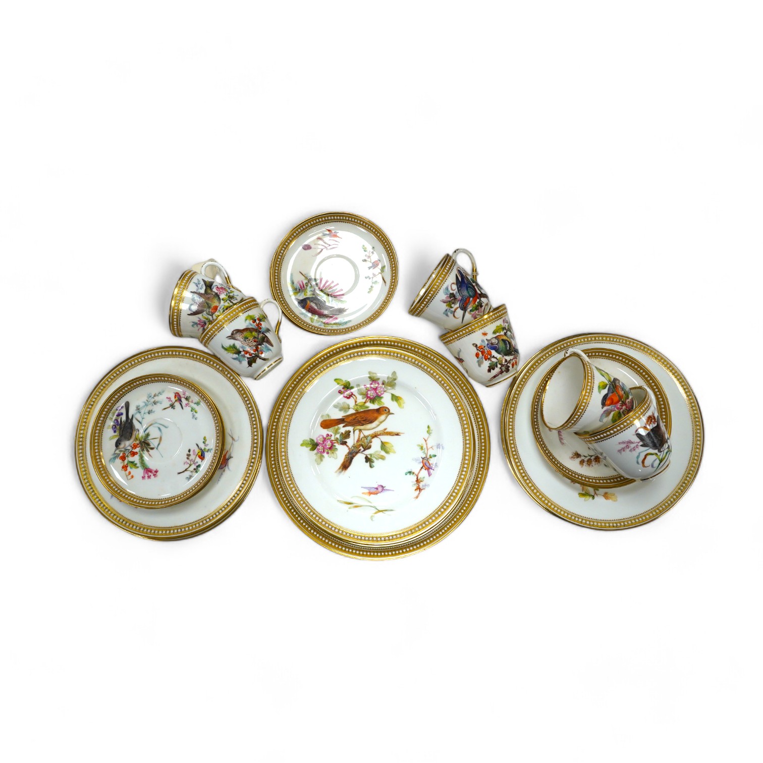 A 19th century Royal Worcester ornithologically decorated part tea set, with gilt and jewelled edges, six place setting. Condition - good